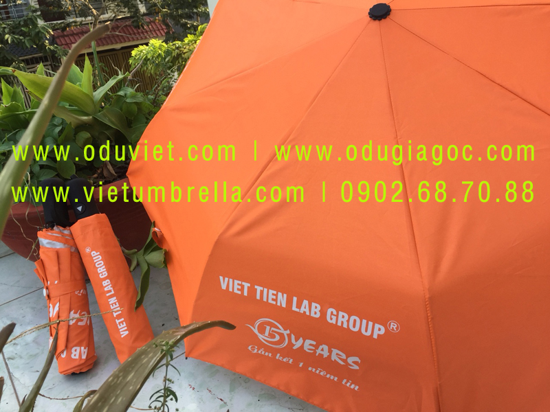 xưởng sản xuất ô dù cầm tay in logo quảng cáo